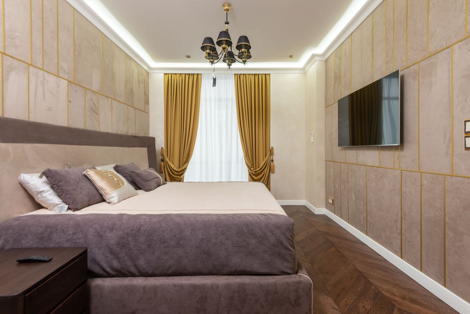 Master bedroom with reading lights and built-in wardrobe