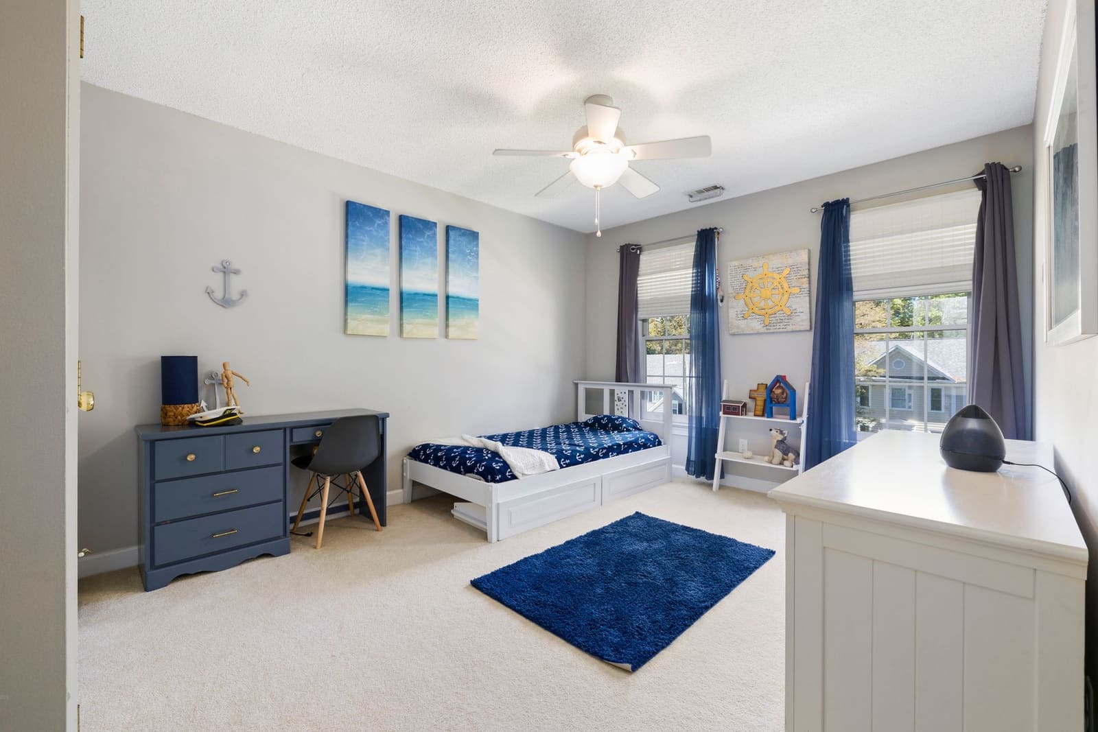 Children's bedroom with a single bed and wardrobe