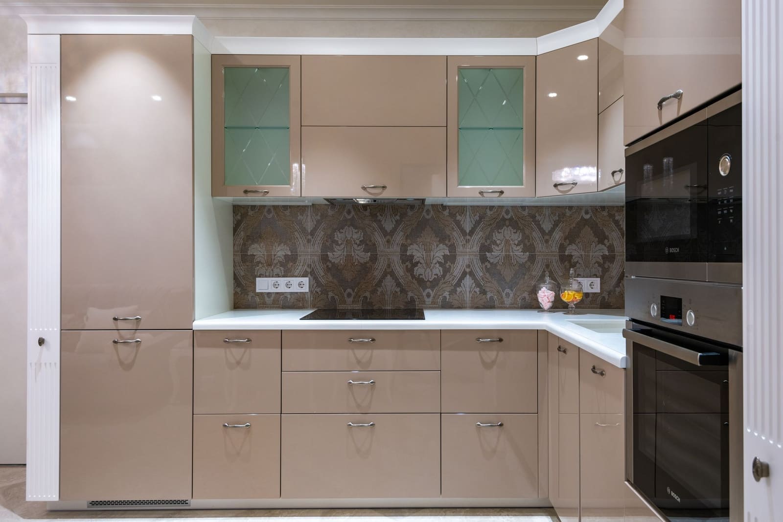 Modular kitchen with island and tall units designed for a Pune apartment
