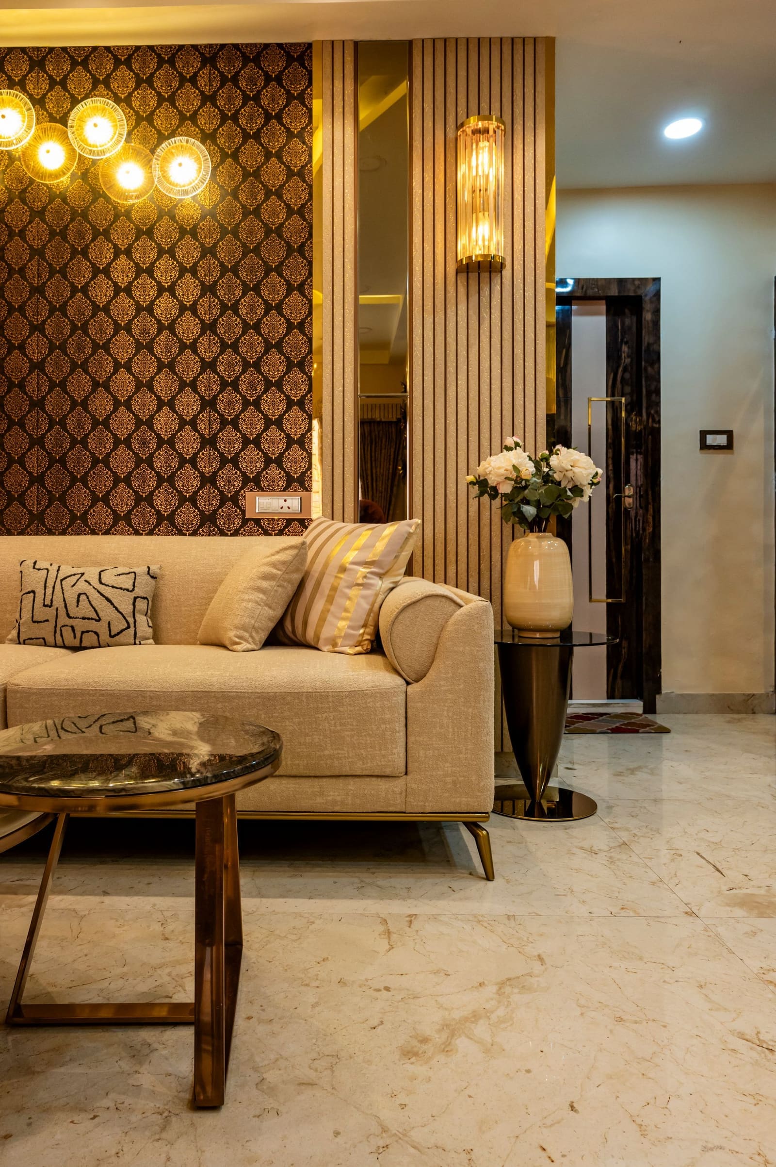 Compact living room with concealed storage in a Hinjewadi 2BHK