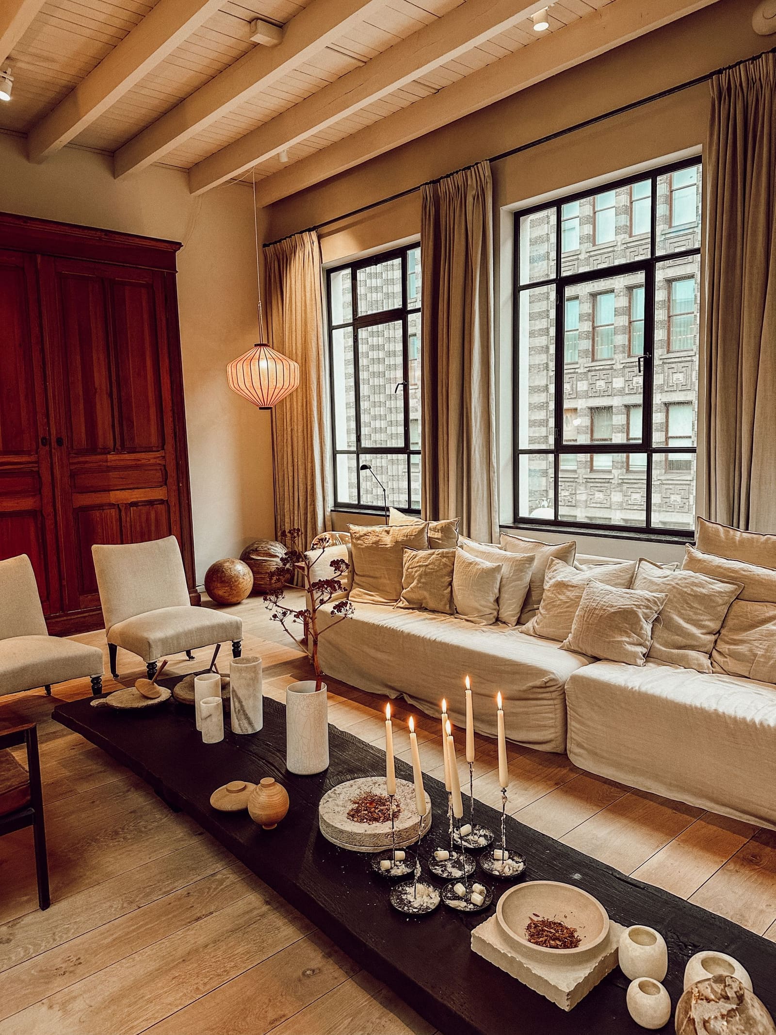 Living room interior with layered lighting and built-in storage in Pune