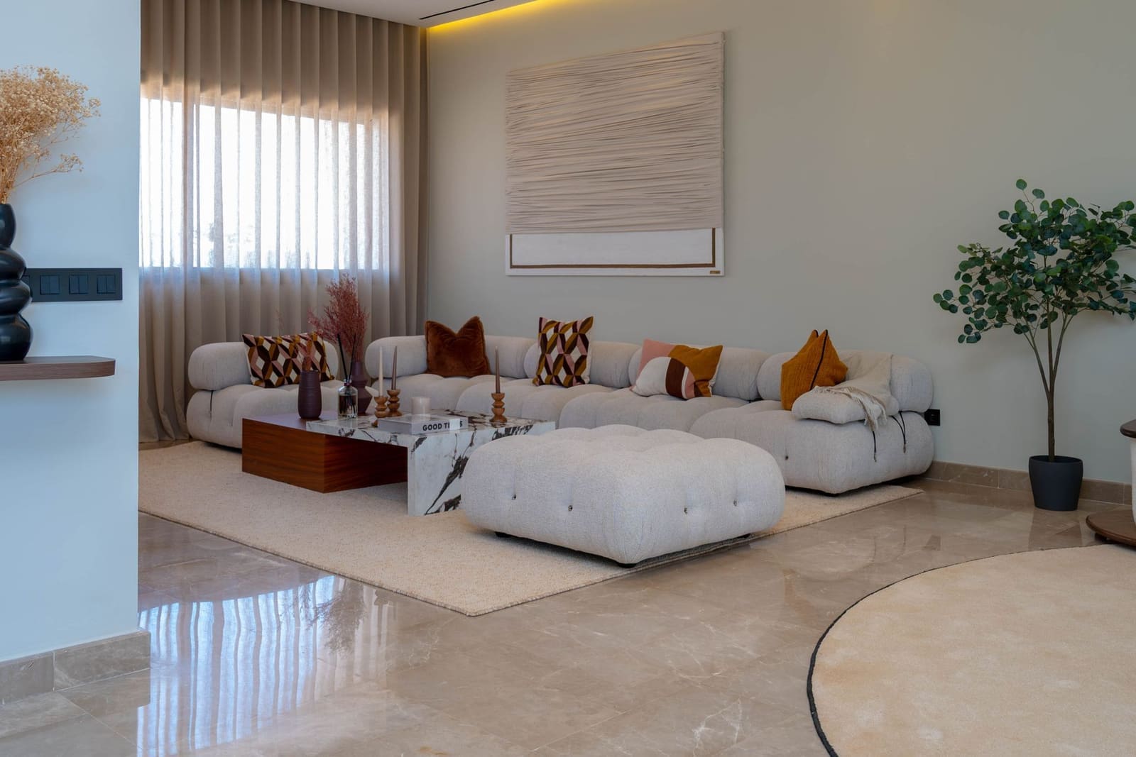 Neutral living room designed for rental use in Viman Nagar, Pune