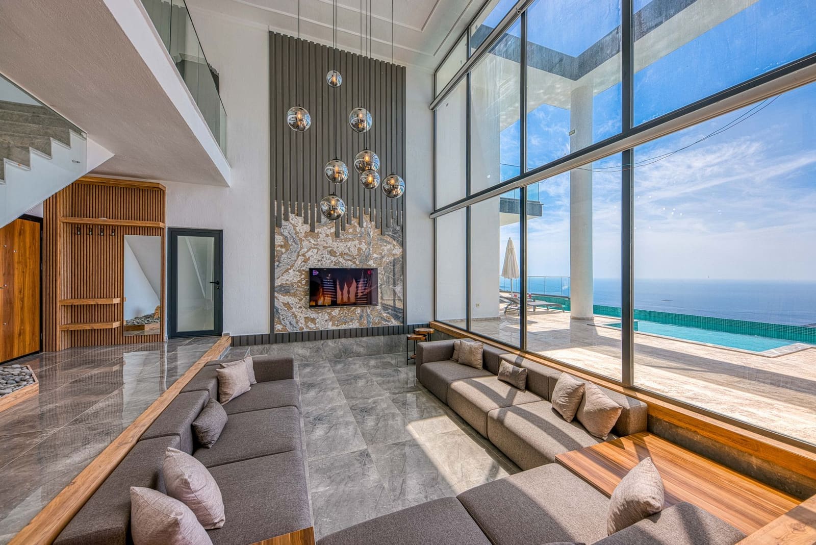 Bungalow living room with double-height glazing in Karve Nagar