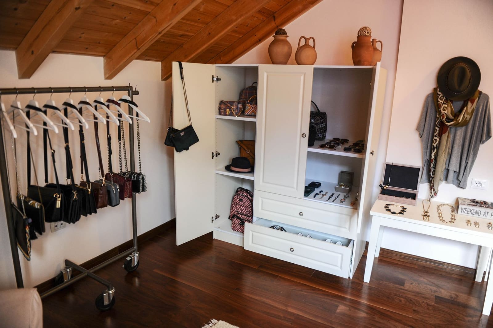 Walk-in wardrobe with internal drawers and hanging sections in Pune