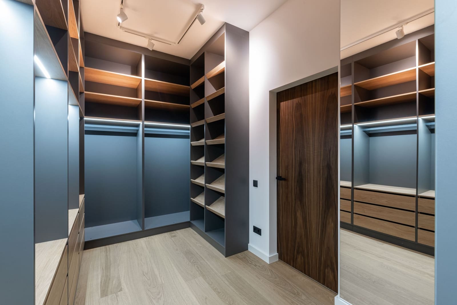 Full-height wardrobe with a loft above